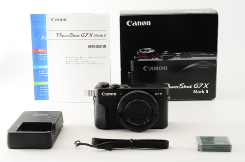 Mint in box - in, canon
